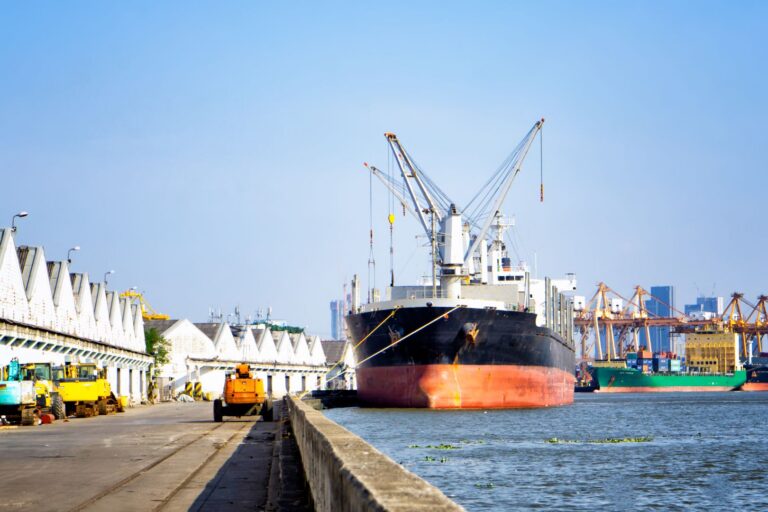 container-ship-moored-at-harbor-against-clear-sky-2026-03-18-07-09-03-utc
