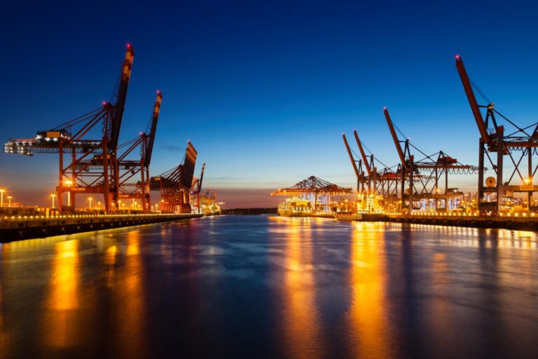 cranes-in-a-port-at-night-2026-03-17-04-24-51-utc
